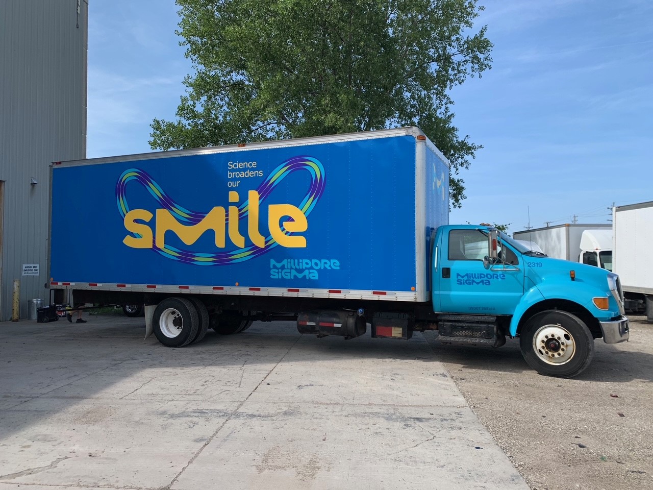 Smile Truck fleets in Milwaukee, WI by Optimum Signs